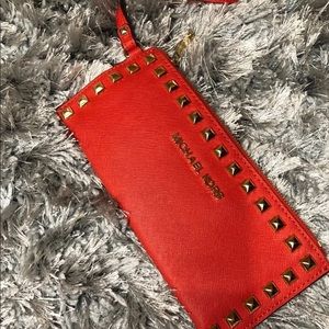 Orange/Red Michael Kors wristlet